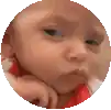 a pixelated image of a baby 's face in a circle .