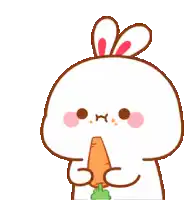 a cartoon rabbit is holding a carrot in its hands .