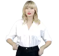 a woman in a white shirt and black pants is giving two thumbs up