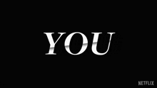 a black background with the word you in white letters .