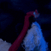 a woman in a white fur coat is singing into a microphone